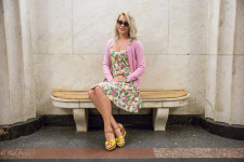 Alyona sitting in the Moscow metro.