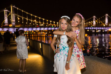 Maria, left, and her friend along the Moscow river.