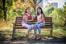 Kyrgyz Relatives Sitting on Bench
