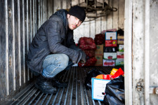 Dima, a Kyrgyzstan native, was helping load a truck with vegetables.