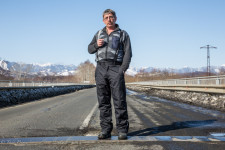 Dmitry standing along the new road from Yuzhno-Sakhalinsk to his town of Poronaysk.