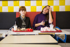 Sasha and Alina (right) eating at Royal Burger in Vladivostok.