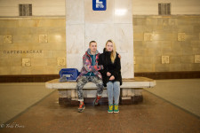 Ilya with his girlfriend at the metro station near their work.