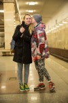 Ilya kissing his girlfriend in the Moscow metro.