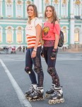 Yulia and Masha were rollerblading in front of the Hermitage in St. Petersburg.
